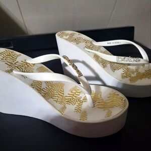 Bebe platform white and gold thong sandals